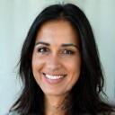 Headshot of Dr. Anya Sharma, a satisfied client.